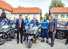 Polizeipräsident Robert Kopp, Manfred Hauser (Nachfolger), Innenminister Joachim Herrmann und weitere Polizeibeamte mit Polizeimotorrädern